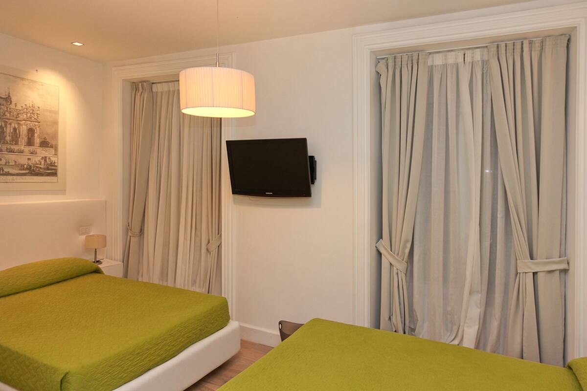 Down comforters, memory foam beds, minibar, in-room safe