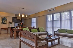 3 Bedroom Pool Villa | Living room | Flat-screen TV, DVD player, iPod dock - Villa Kumuda by Nakula (Canggu)