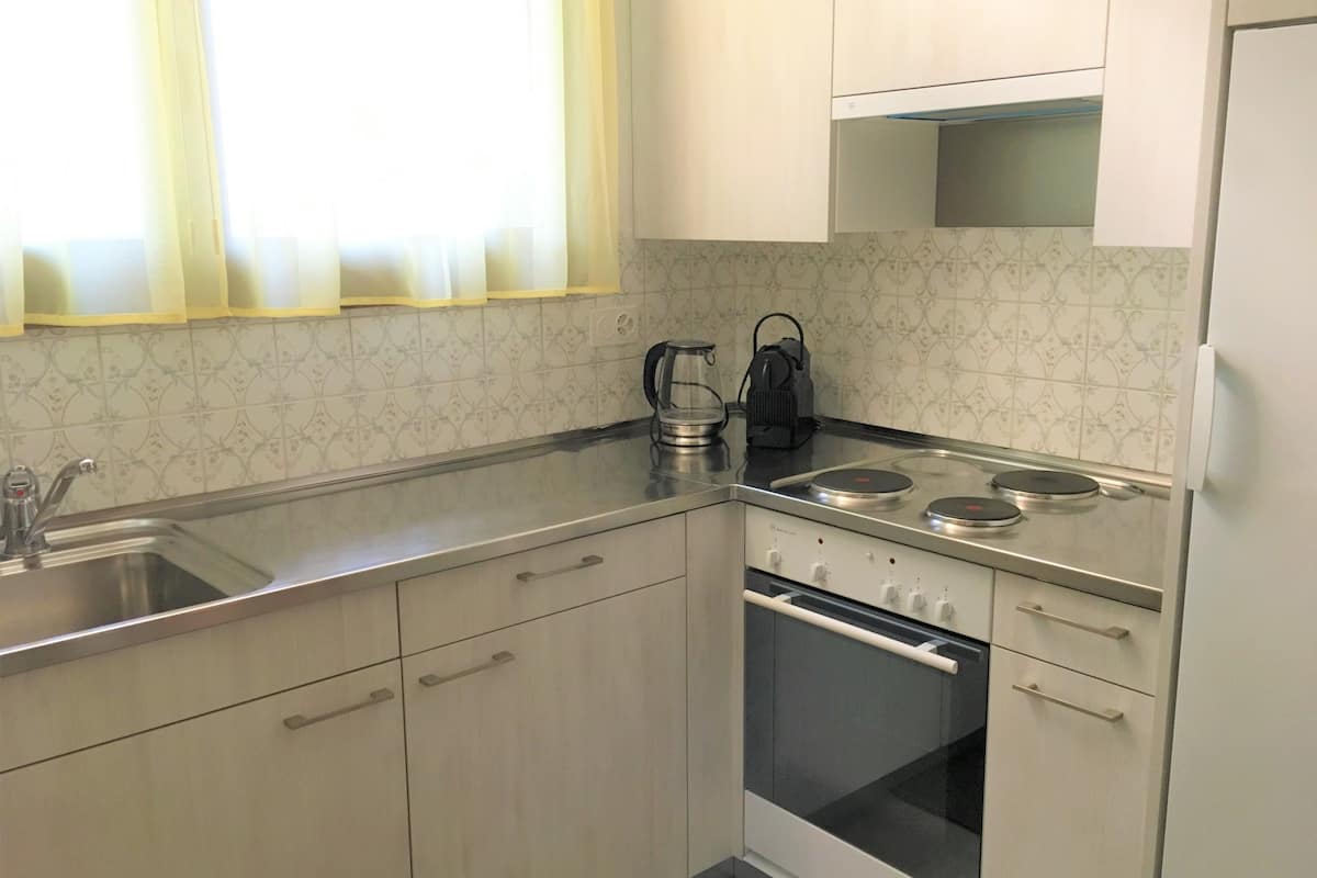 family penthouse, 4 bedrooms, terrace, garden view | private kitchen | full-sized fridge, stovetop, espresso maker, coffee/tea maker