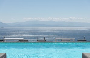 Outdoor pool, pool umbrellas, pool loungers