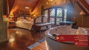 Un dormitorio con dos camas, una bañera grande y vistas al exterior a través de una ventana.
