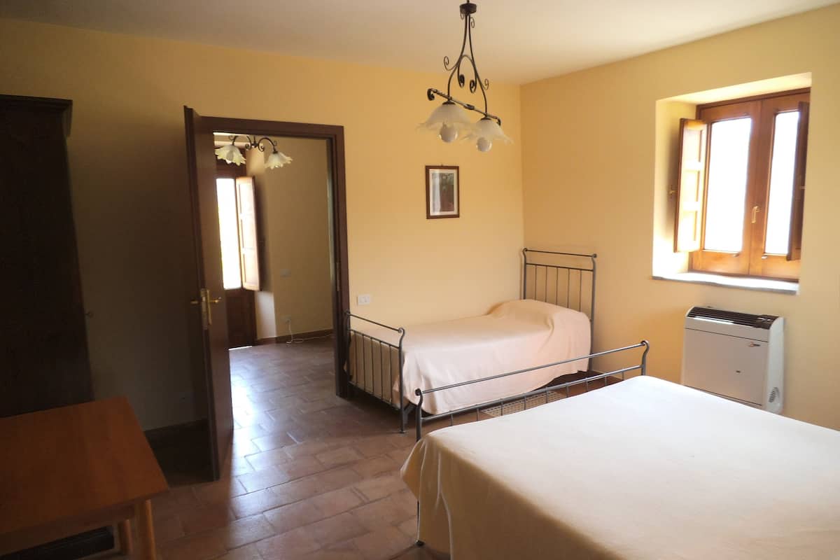 Appartement, 1 slaapkamer (3 people) | Een kluis op de kamer, babybedden, gratis wifi