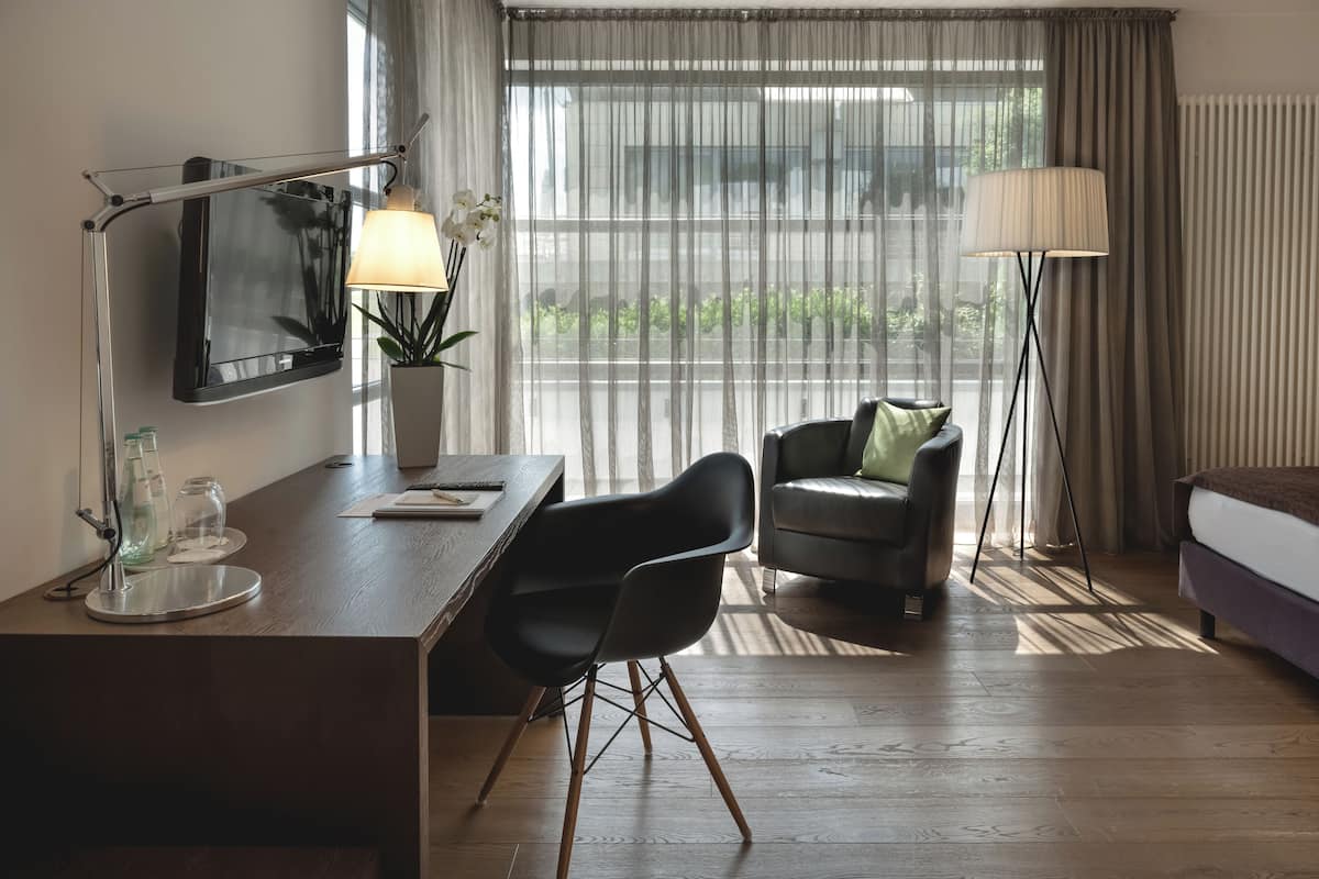 comfort double room single use | premium bedding, in-room safe, desk, laptop workspace