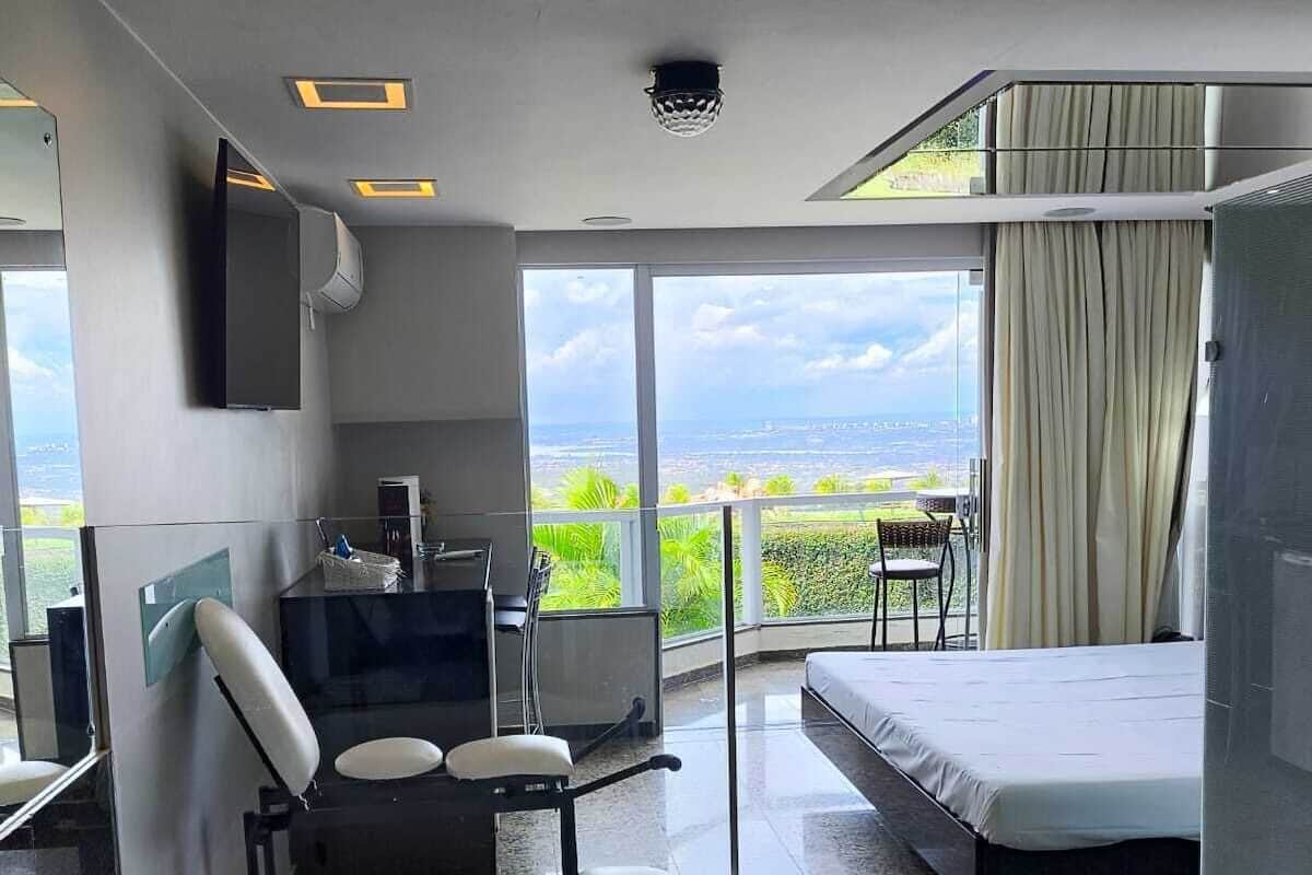 Deluxe kamer | Een minibar, beddengoed