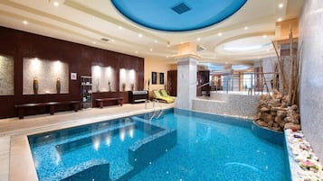Seasonal outdoor pool, open 9:00 AM to 6:00 PM, pool umbrellas