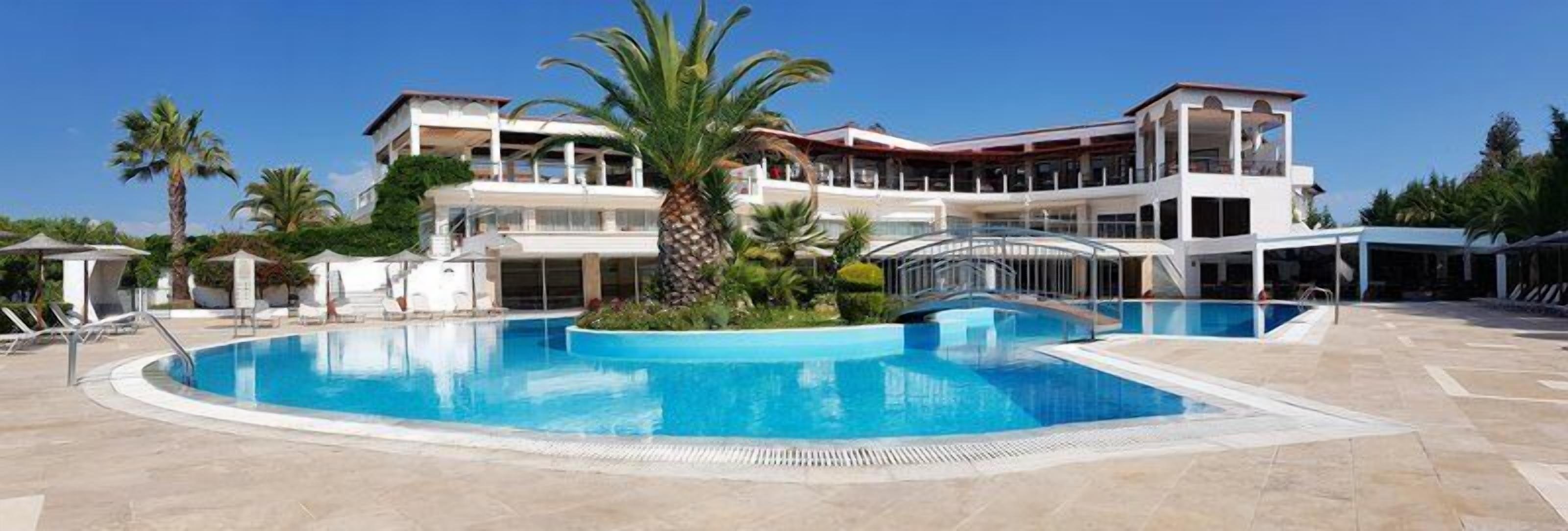 Seasonal outdoor pool, open 9:00 AM to 6:00 PM, pool umbrellas