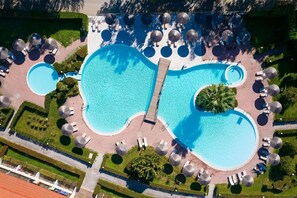 Indoor pool, seasonal outdoor pool, pool umbrellas, sun loungers