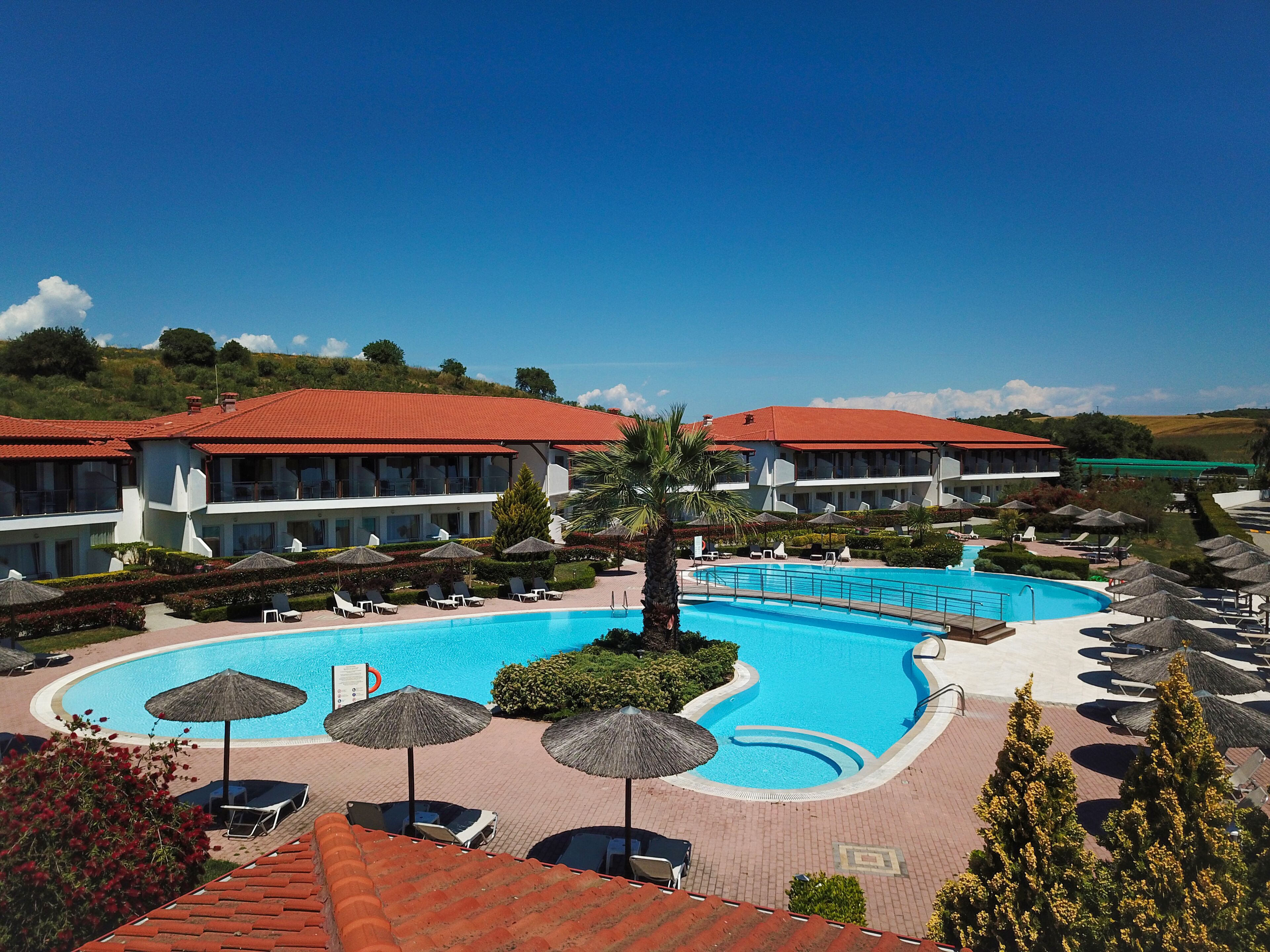 Indoor pool, seasonal outdoor pool, pool umbrellas, sun loungers