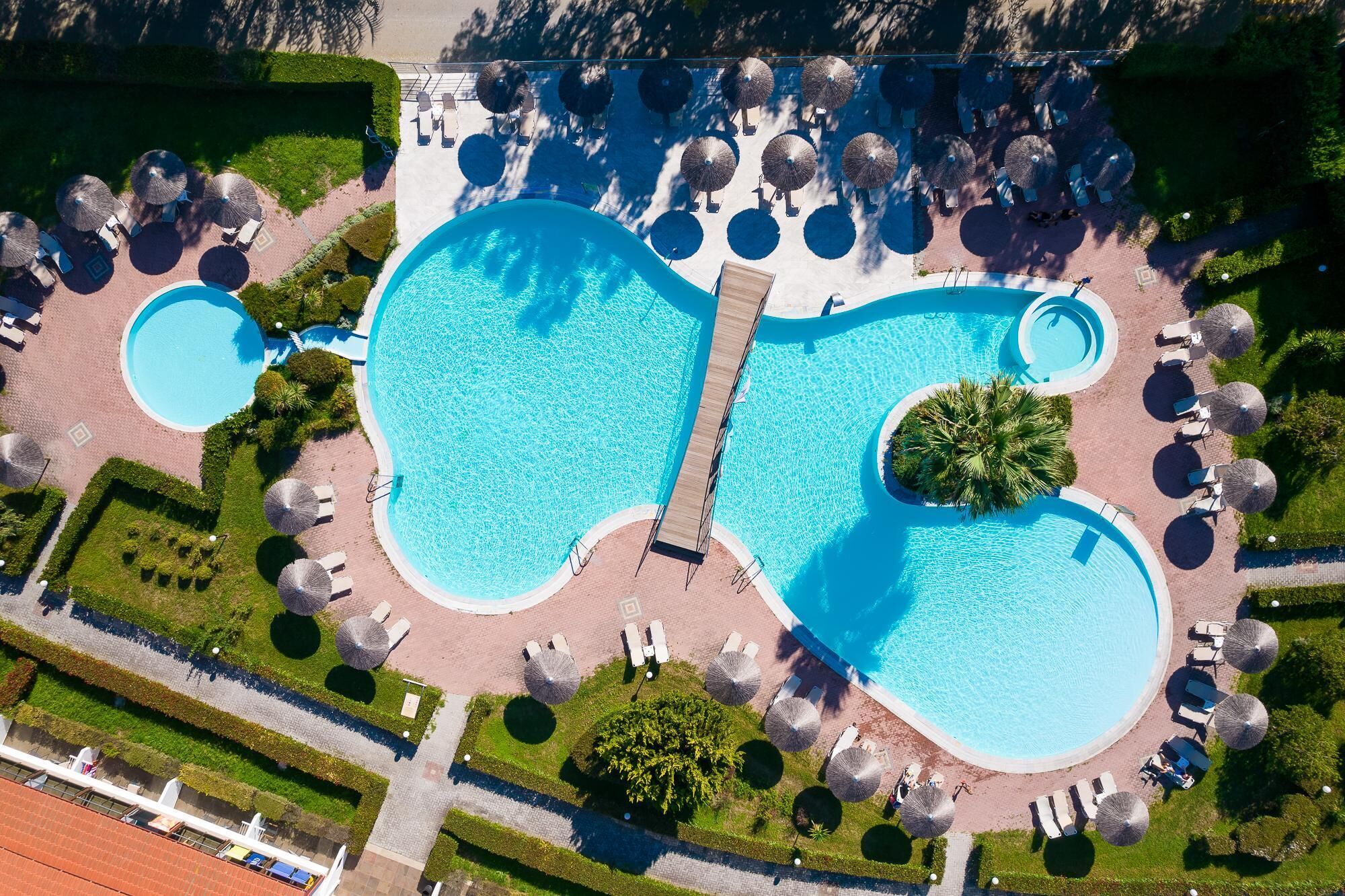 Indoor pool, seasonal outdoor pool, pool umbrellas, sun loungers