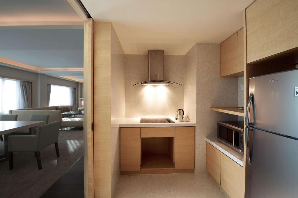 Cocina privada | Frigobar y cafetera y tetera 