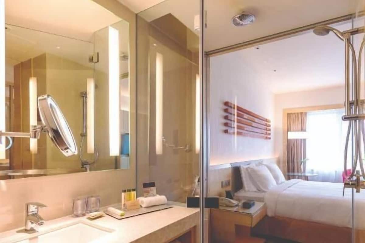 Bathroom | Shower, rainfall showerhead, designer toiletries, hair dryer