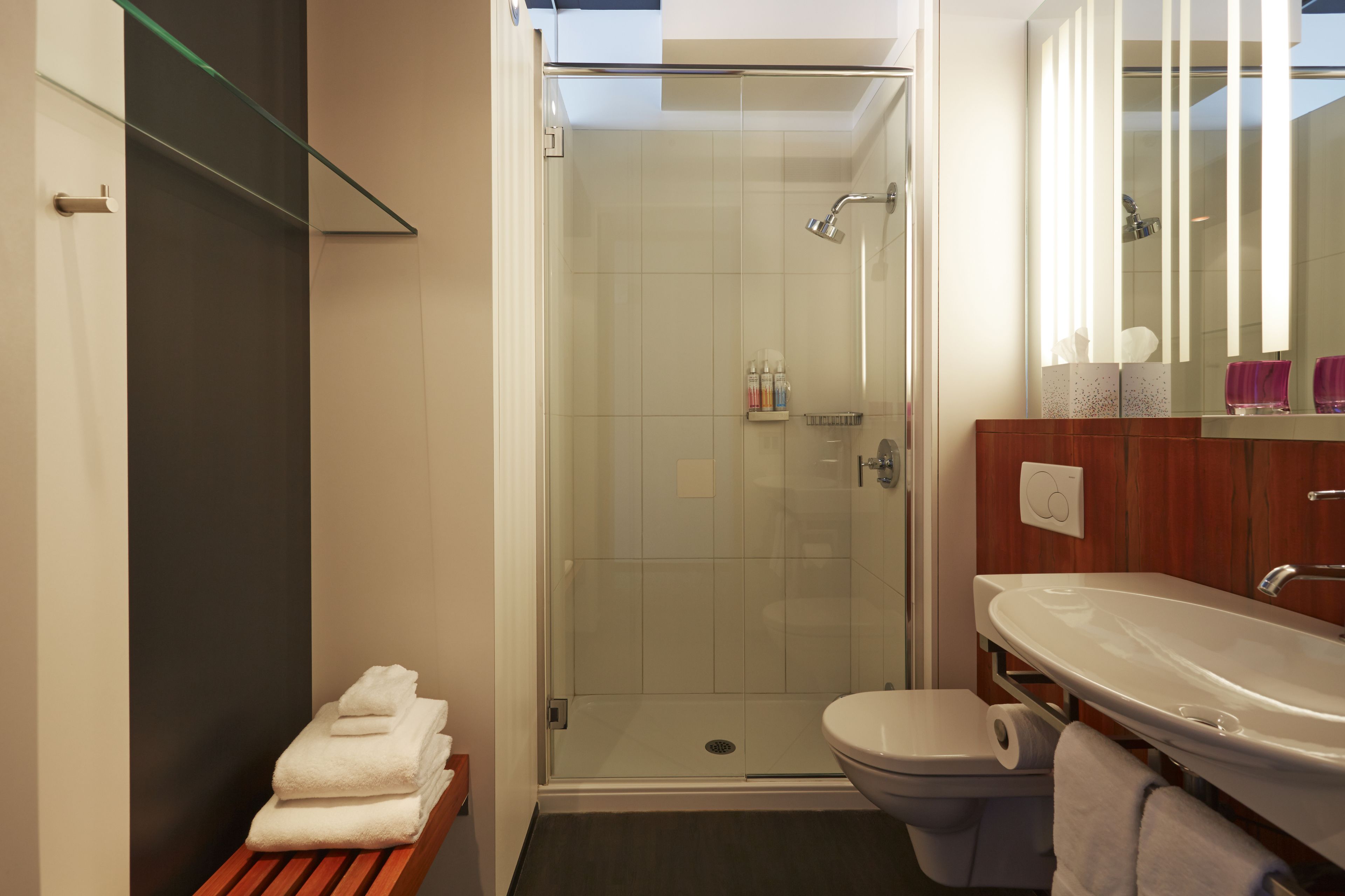 standard room | bathroom | shower, rainfall showerhead, hair dryer, towels