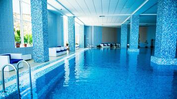 Indoor pool, seasonal outdoor pool, pool umbrellas, sun loungers
