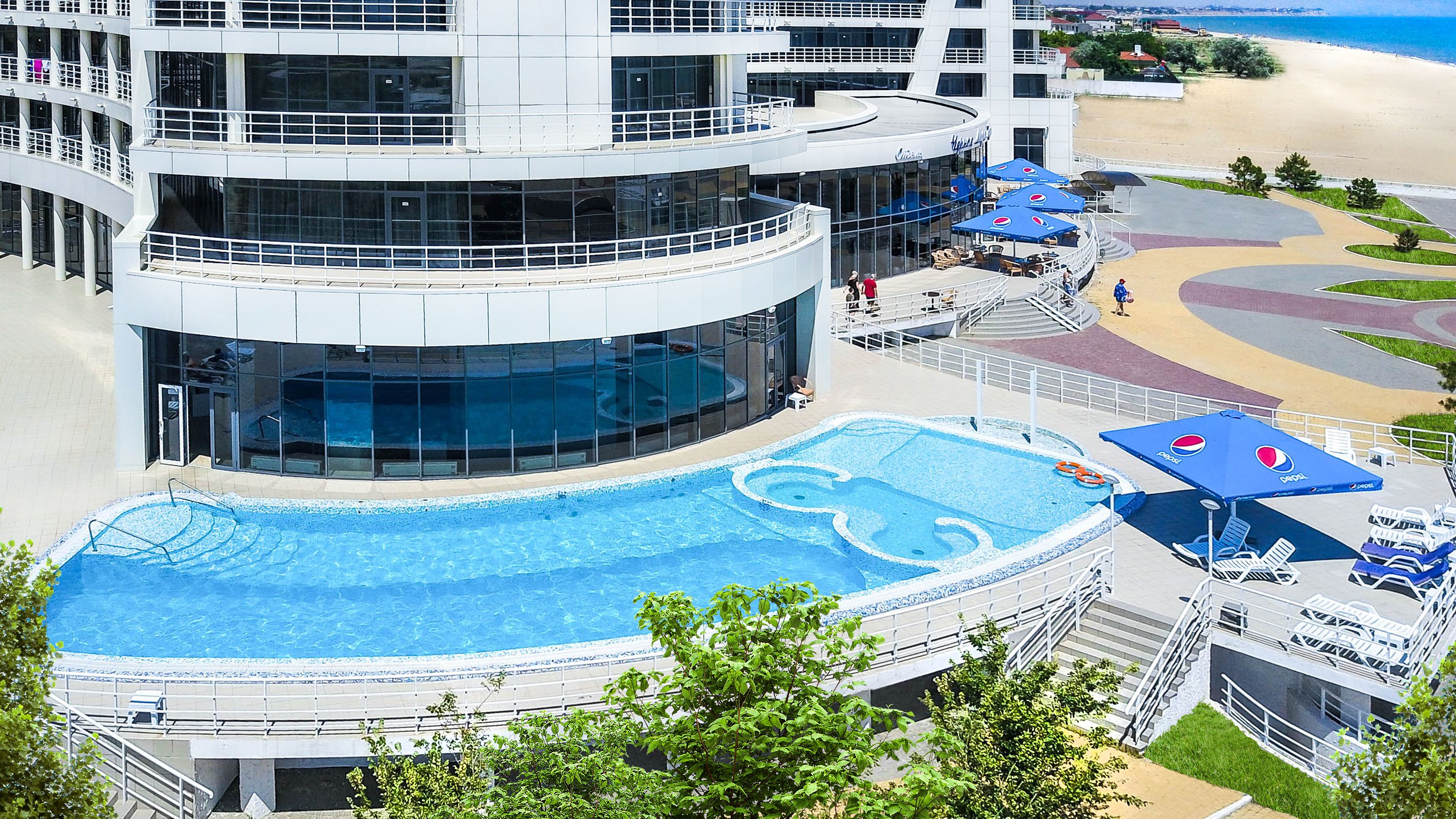 Indoor pool, seasonal outdoor pool, pool umbrellas, pool loungers