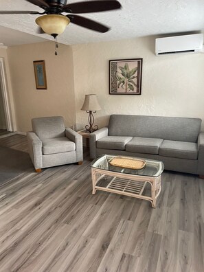 Large 1 Bedroom, Kitchen, Patio | Living room | 42-inch flat-screen TV with cable channels, TV