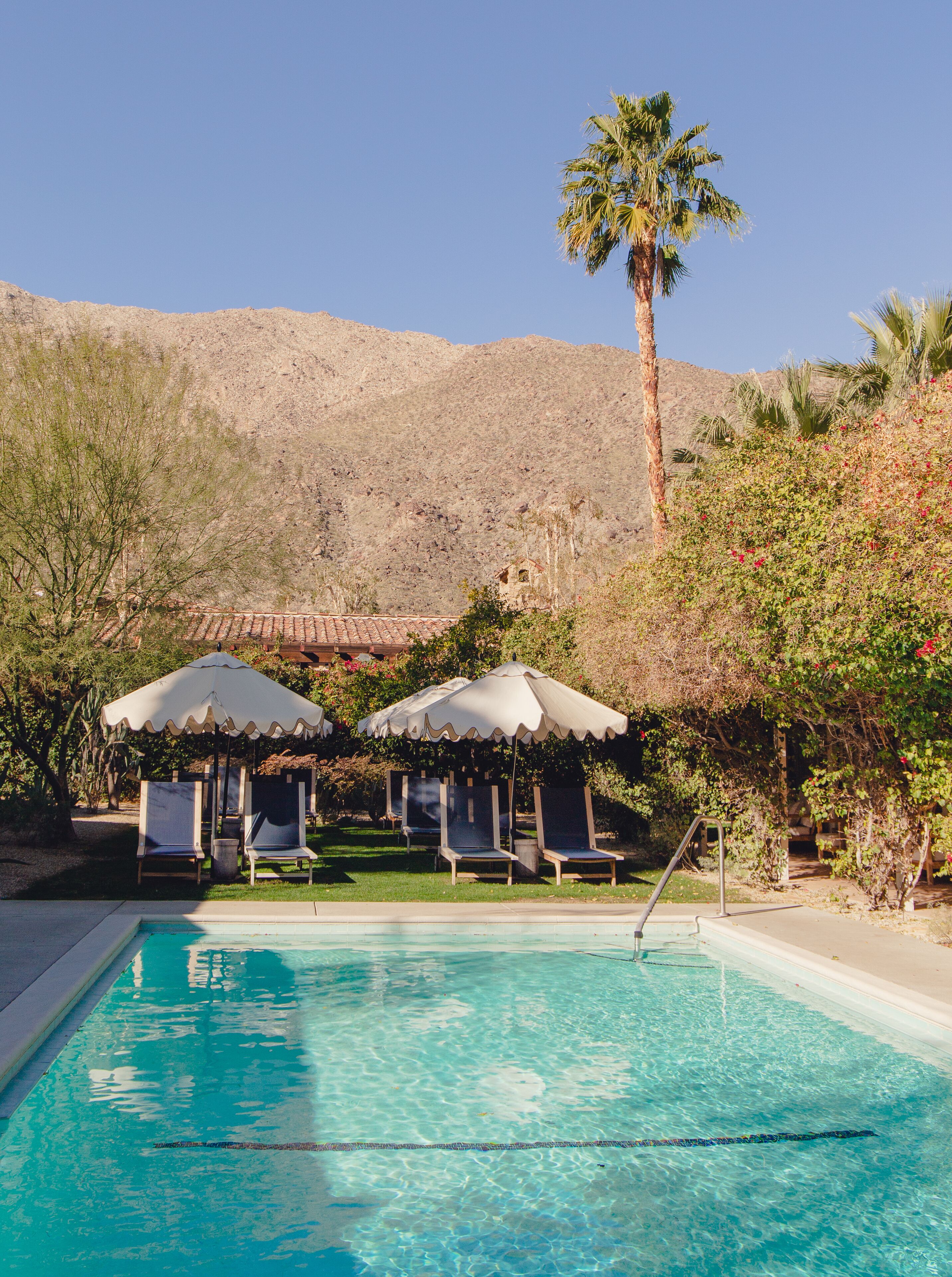 2 outdoor pools, open 6:00 am to 11:00 pm, pool umbrellas, pool loungers