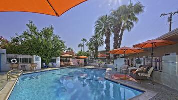 Outdoor pool, pool umbrellas, sun loungers