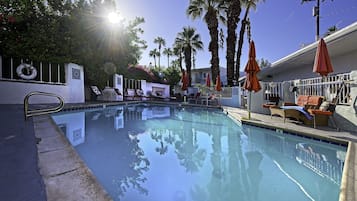 Outdoor pool, pool umbrellas, sun loungers