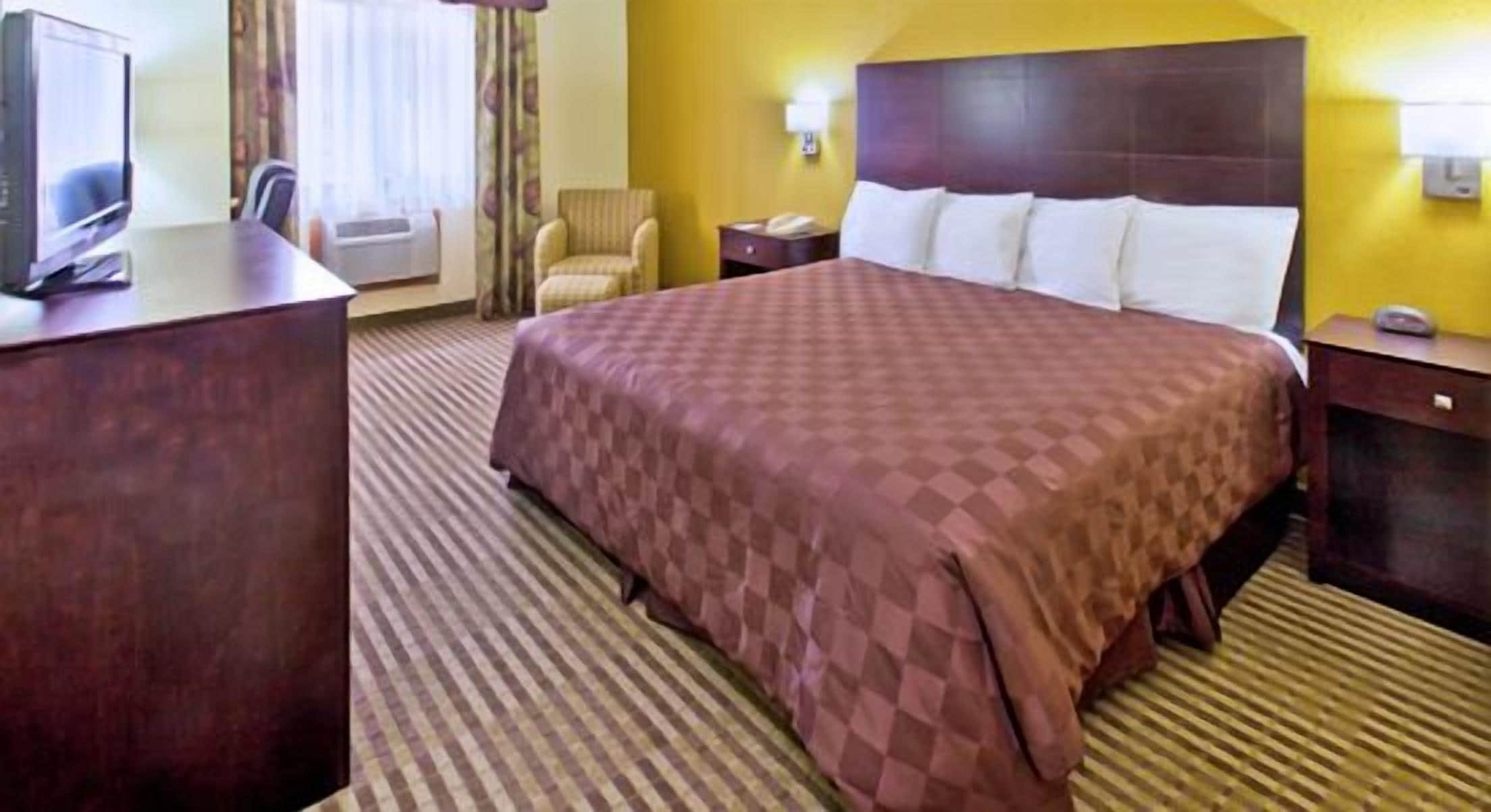 Pillow-top beds, desk, blackout curtains, iron/ironing board