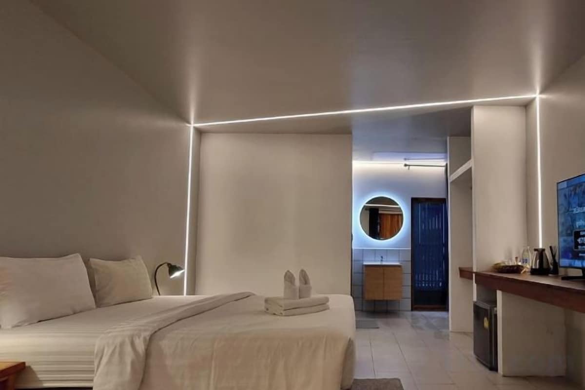 Desk, laptop workspace, free WiFi, bed sheets