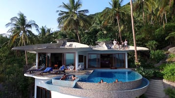 Orchid Villa | Outdoor pool | 3 outdoor pools, pool umbrellas, pool loungers