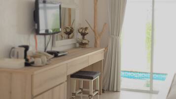 Costa by the Pool | Minibar, in-room safe, desk, soundproofing