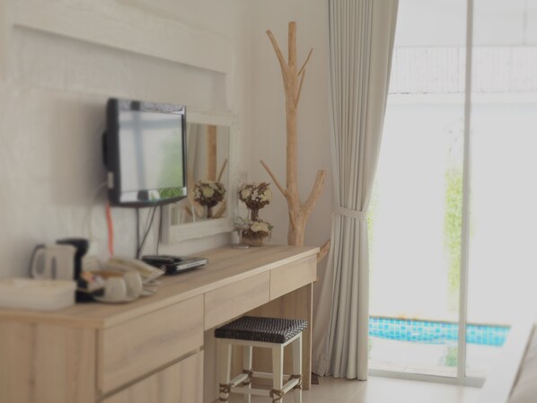 Costa by the Pool | Minibar, in-room safe, desk, soundproofing - Costa Village Well Pool Villa Pattaya (Pattaya)