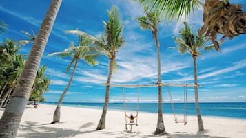 Private beach, white sand, sun-loungers, beach umbrellas