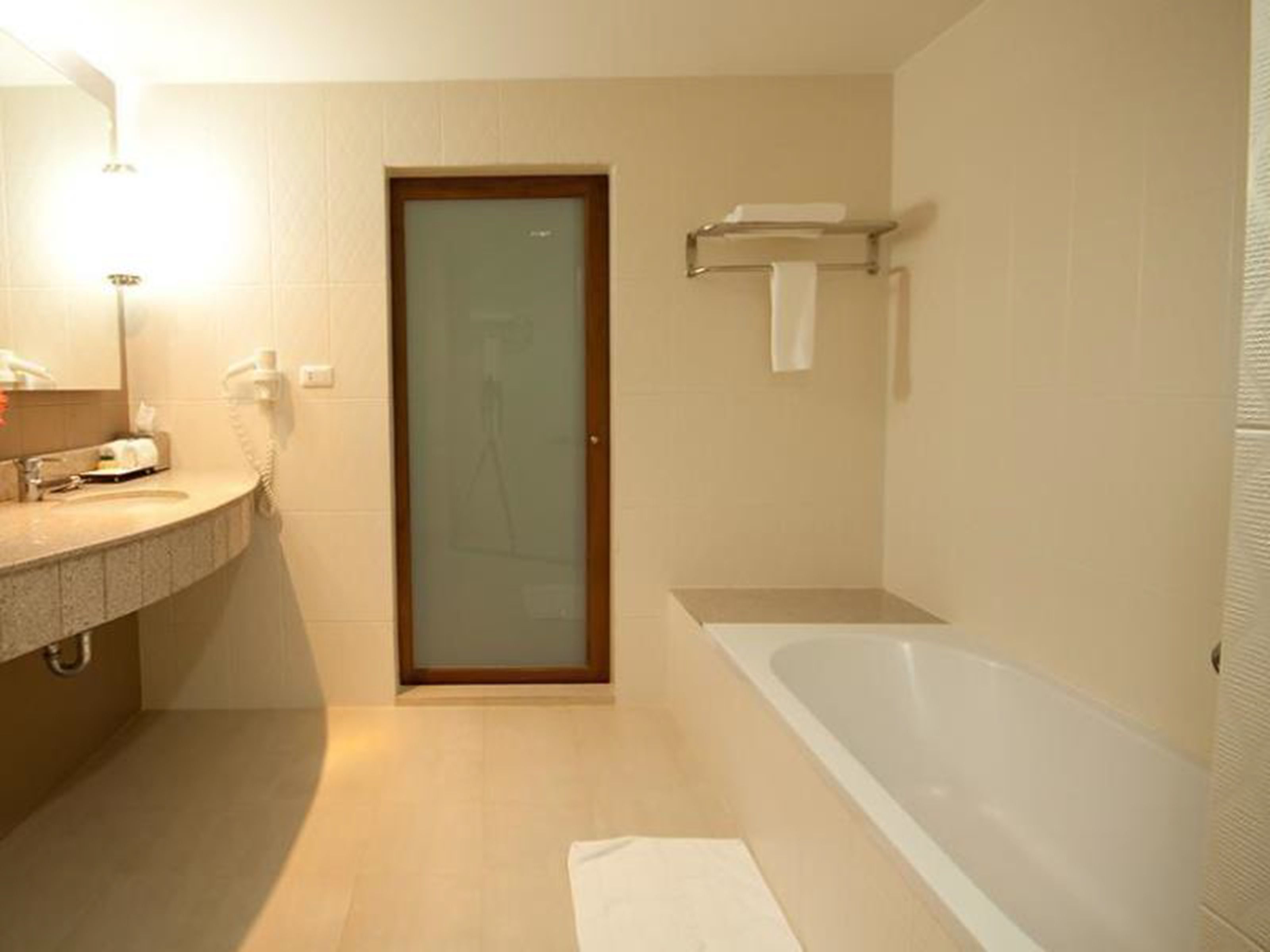 one bed room suite | bathroom | separate bathtub and shower, rainfall showerhead, free toiletries