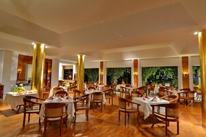 Breakfast, lunch, dinner served; local cuisine 