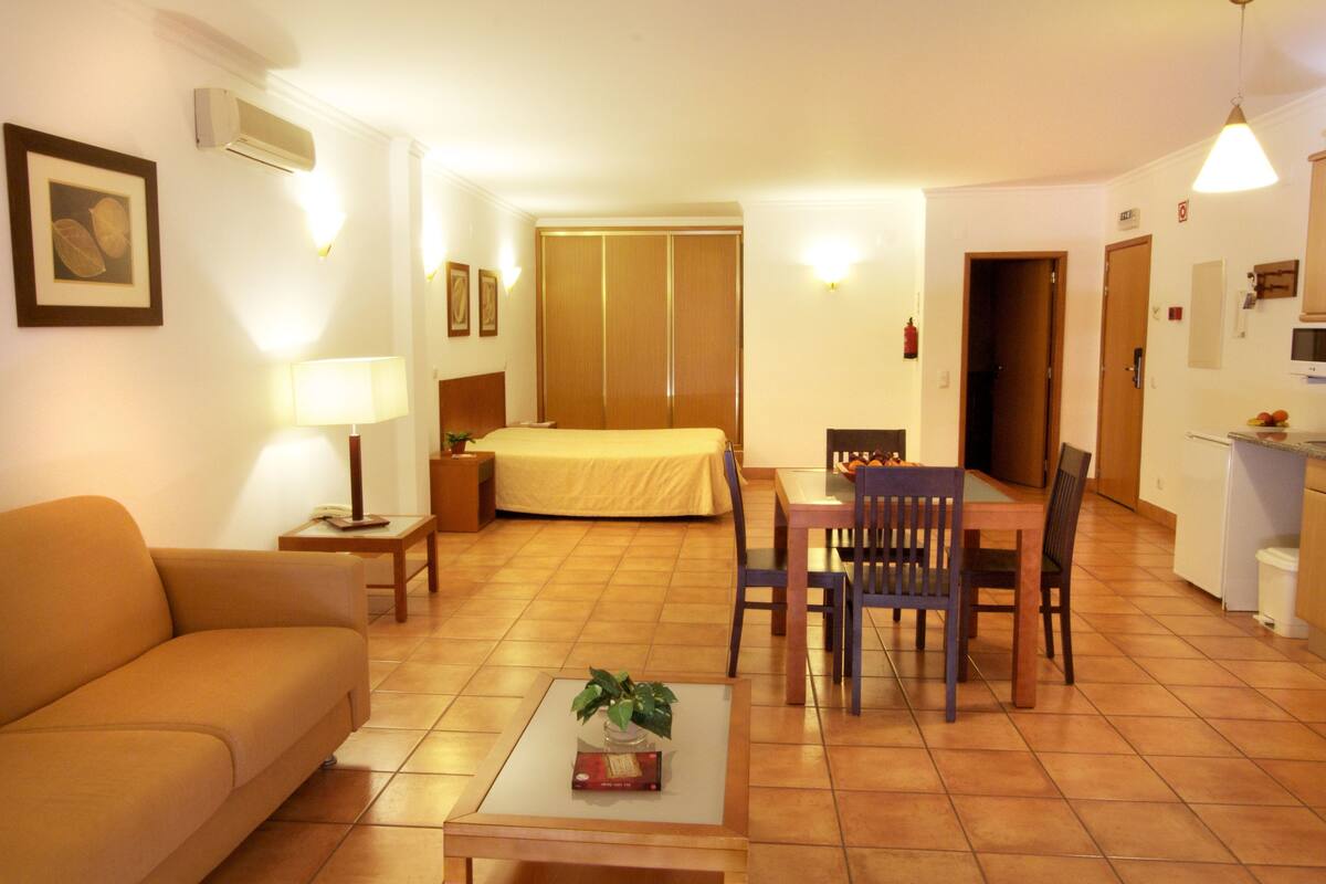 Studio, Partial Sea View | In-room safe, blackout drapes, iron/ironing board, cribs/infant beds