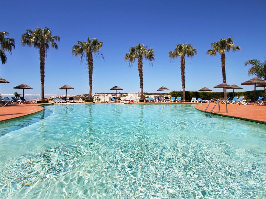 Outdoor pool, pool umbrellas, sun loungers