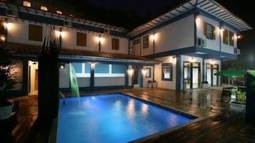 Outdoor pool, open 8 AM to 10 PM, pool umbrellas, sun loungers