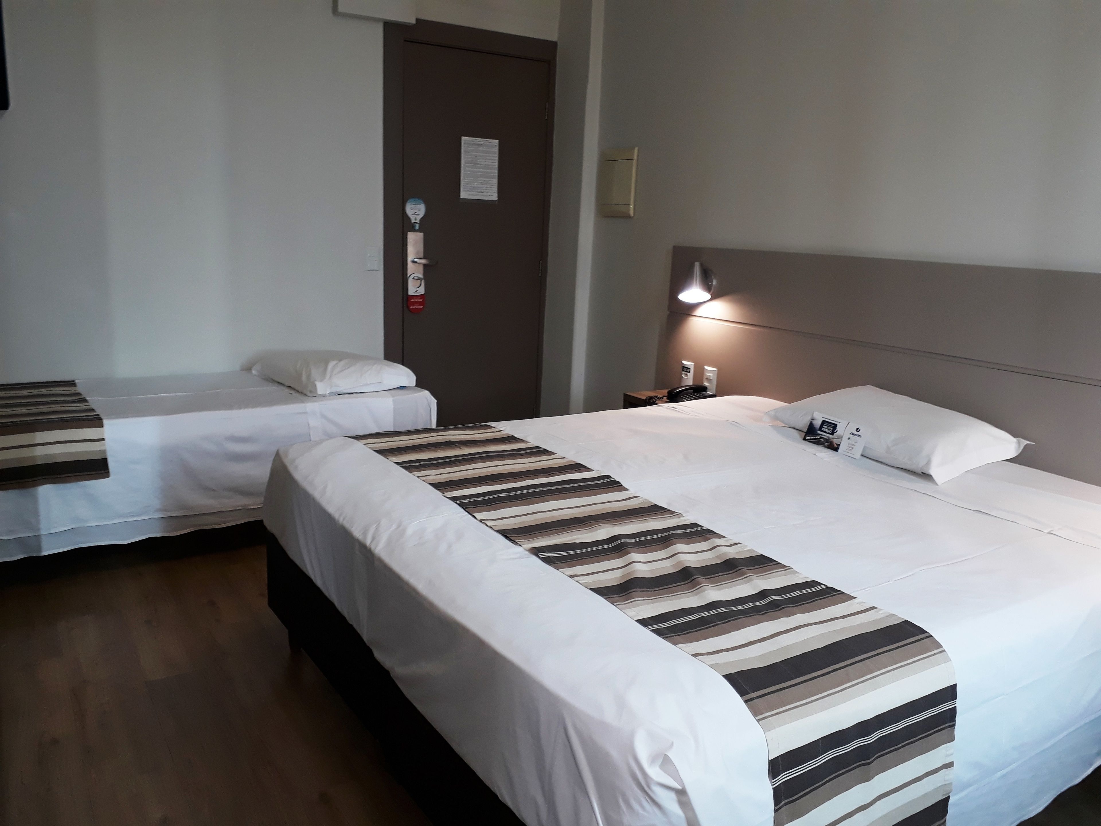 standard triple room | minibar, in-room safe, desk, blackout curtains