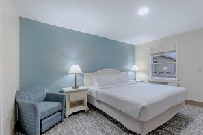 Laptop workspace, blackout drapes, soundproofing, iron/ironing board