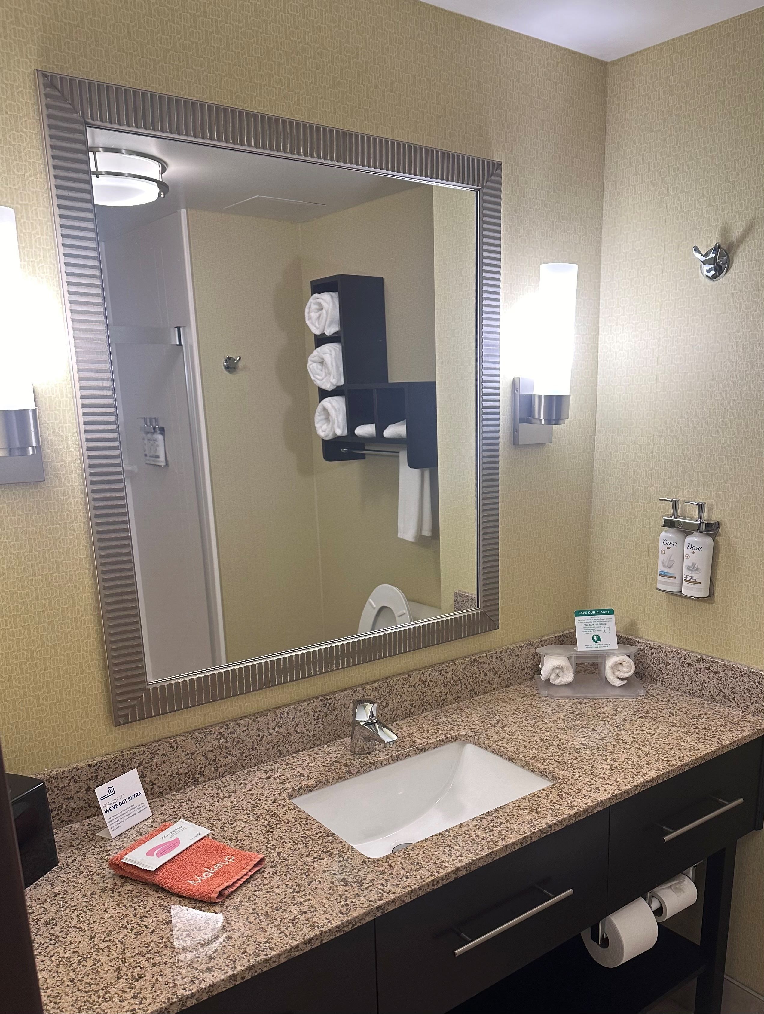 bathtub, free toiletries, hair dryer, towels