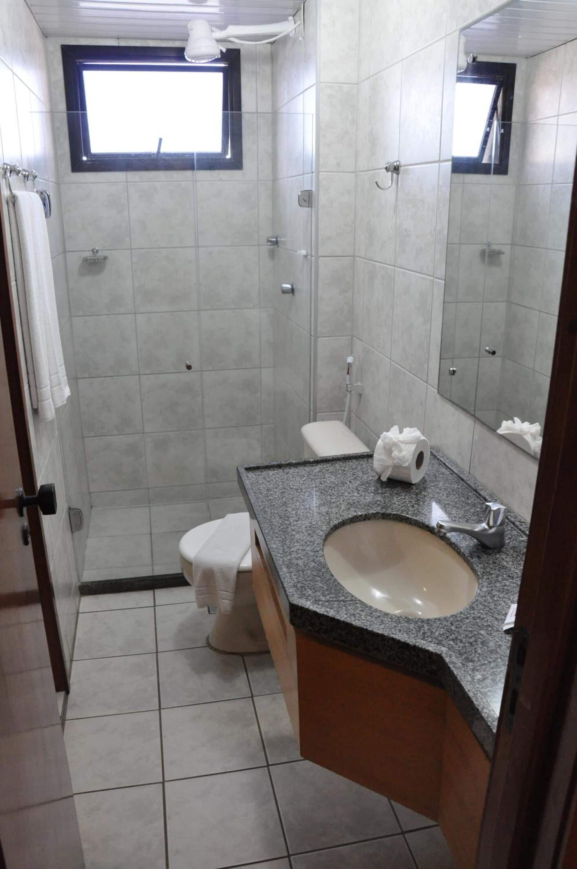 standard room | bathroom | shower, hair dryer, towels