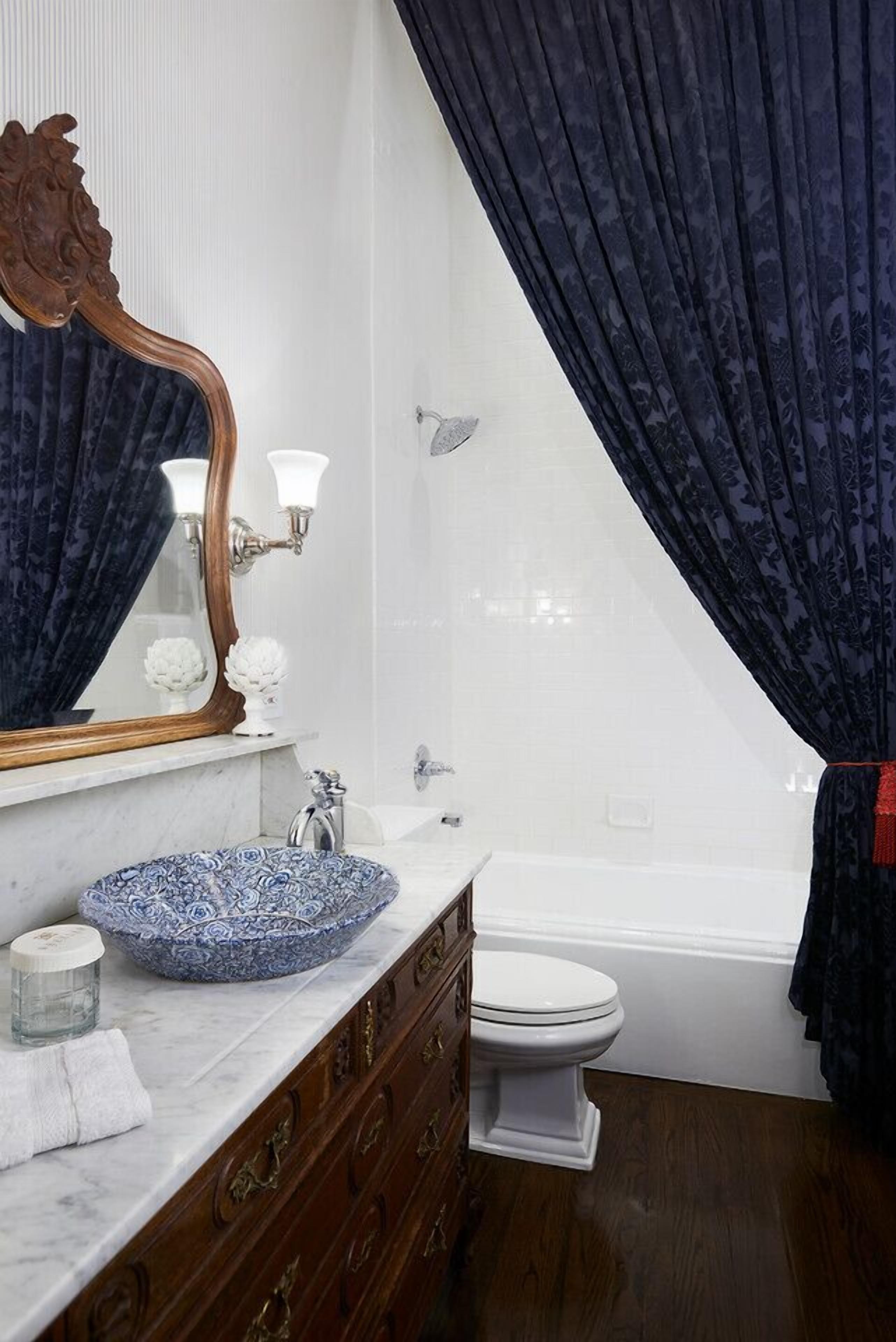 luxury room | bathroom | designer toiletries, hair dryer, bathrobes, towels
