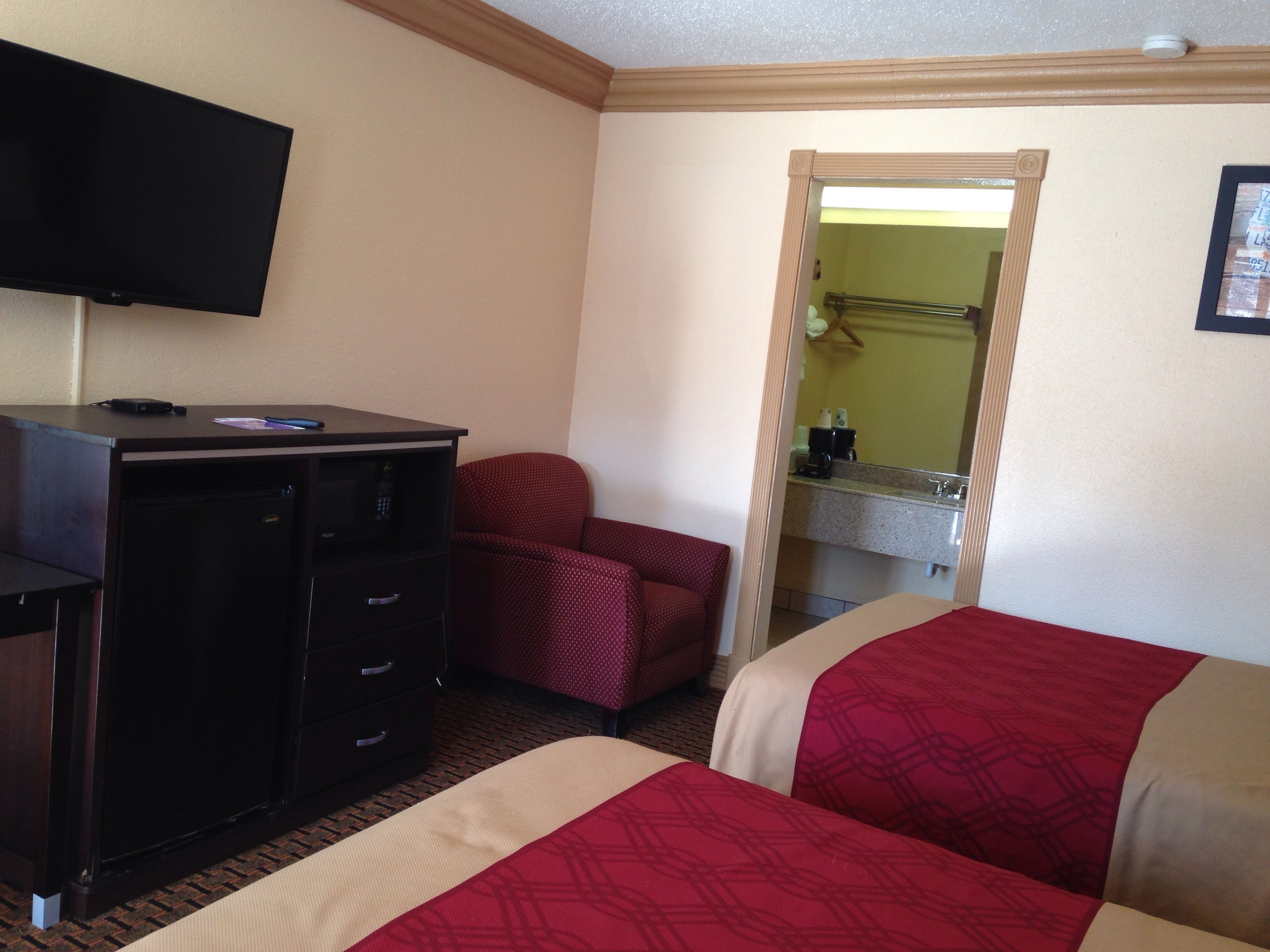 standard room, 2 double beds, non smoking | living area | tv