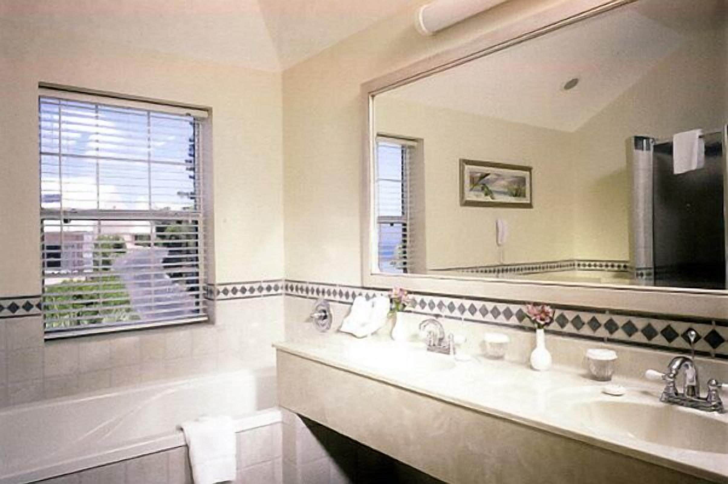 separate bathtub and shower, free toiletries, hair dryer, bathrobes