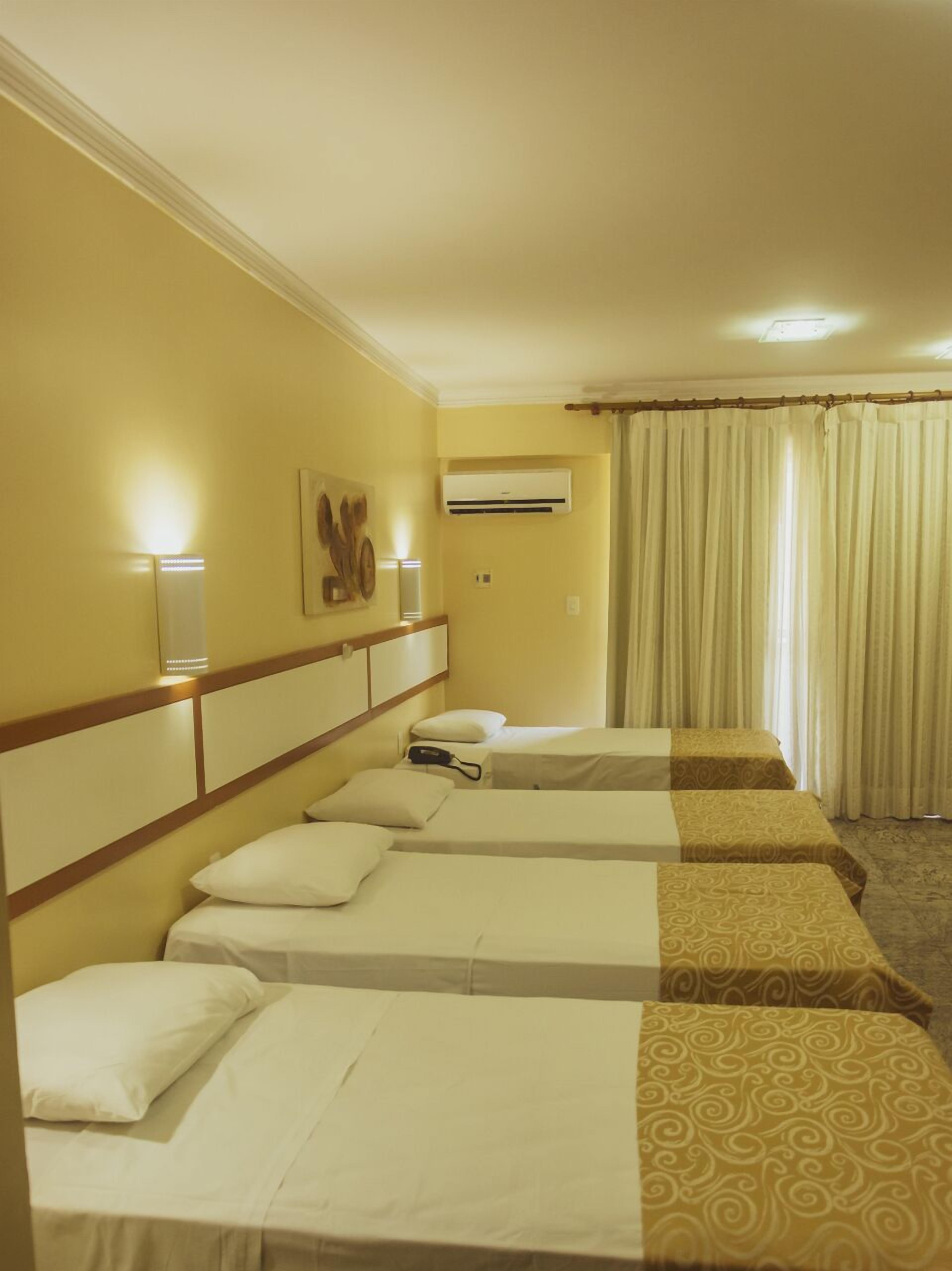 standard quadruple room | 1 bedroom, minibar, in-room safe, desk