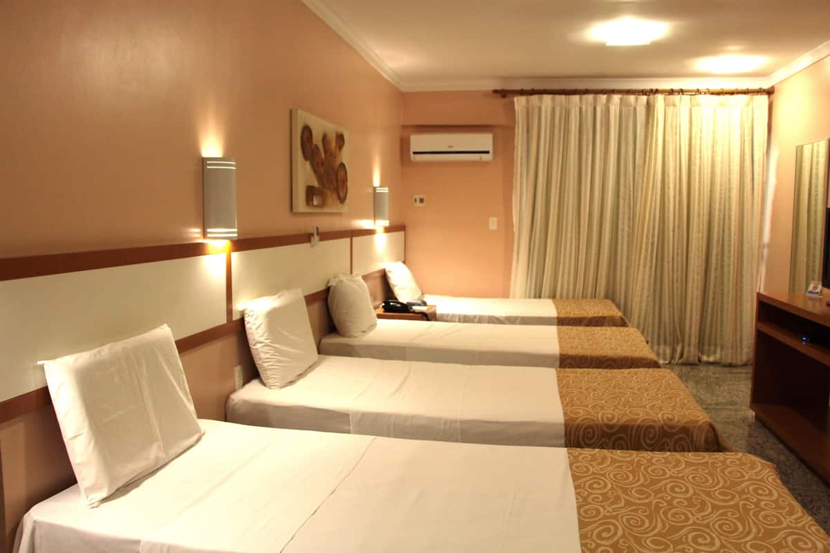 standard quadruple room | 1 bedroom, minibar, in-room safe, desk