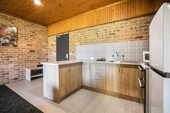 Two Bedroom Apartment | Private kitchenette | Fridge, microwave, electric kettle, toaster