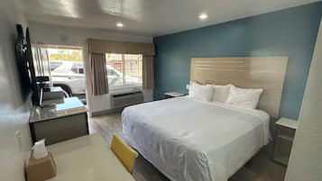 Standard Room, 1 King Bed | Desk, iron/ironing board, free WiFi, bed sheets