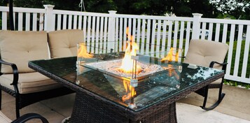 Seasonal outdoor pool, open 9 AM to 9 PM, pool umbrellas, pool loungers