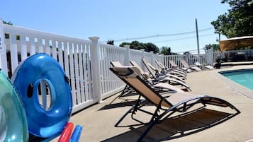 Seasonal outdoor pool, open 9 AM to 9 PM, pool umbrellas, sun loungers