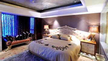 Premium bedding, down comforters, free minibar items, in-room safe