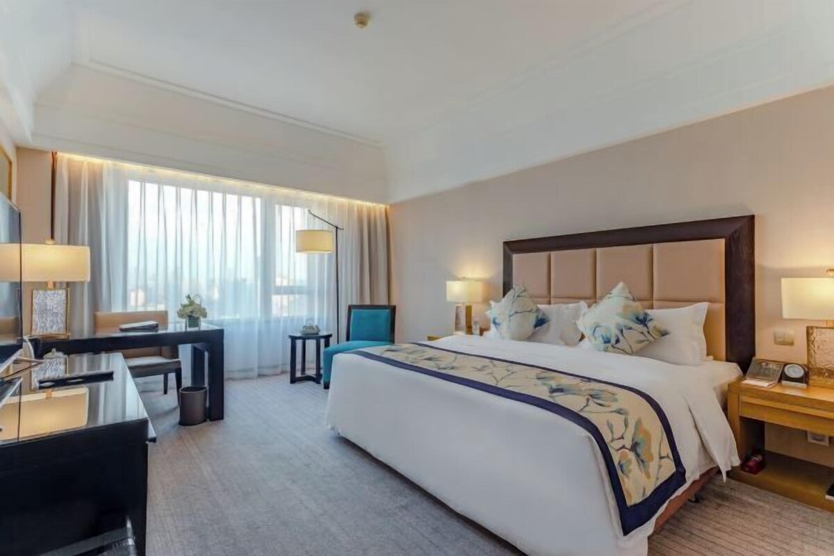 Ropa de cama de alta calidad, edredón y artículos del minibar gratis