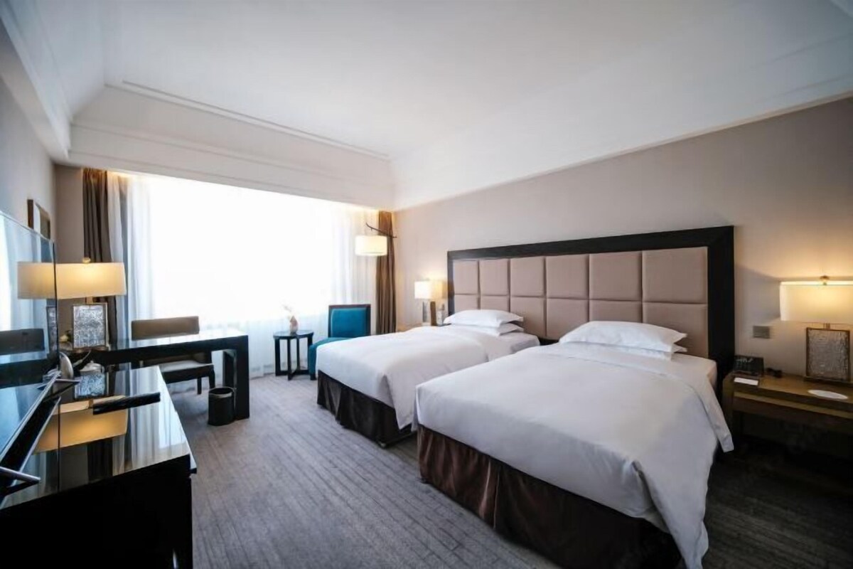 Ropa de cama de alta calidad, edredón y artículos del minibar gratis