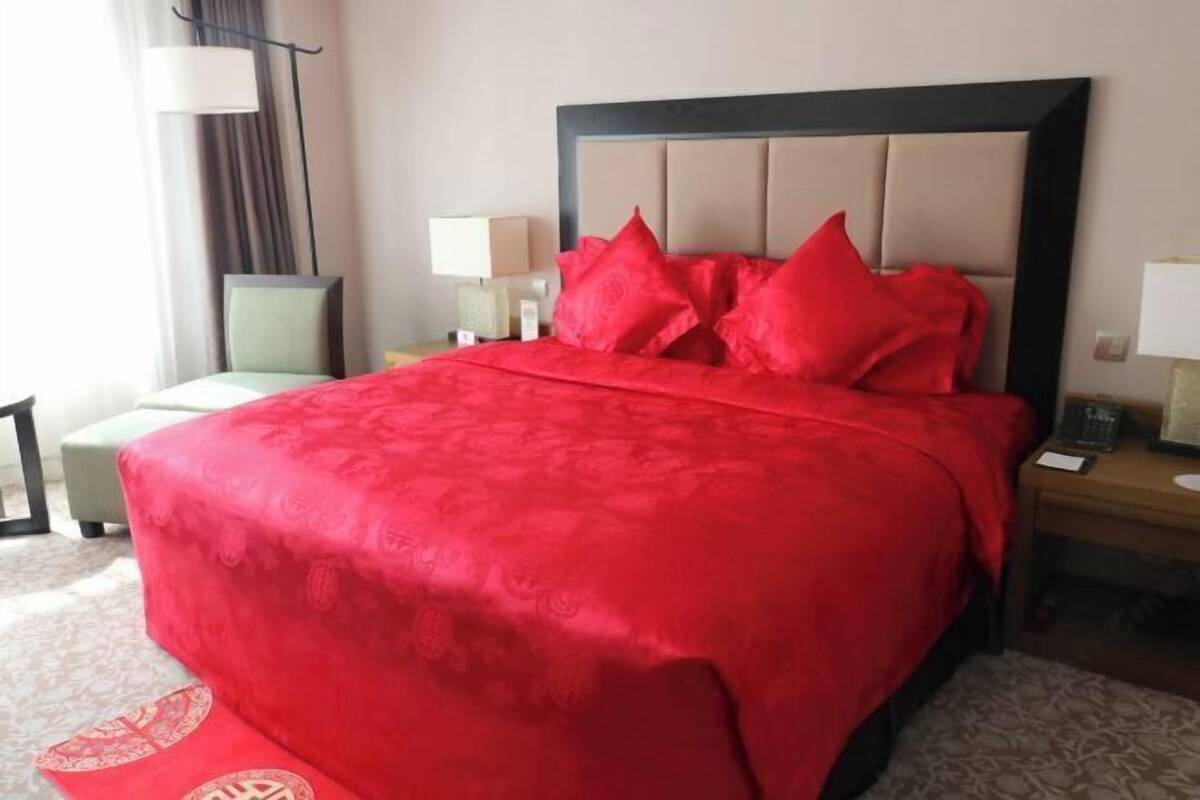 Ropa de cama de alta calidad, edredón y artículos del minibar gratis